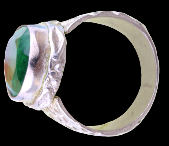 Silver ring with green stone