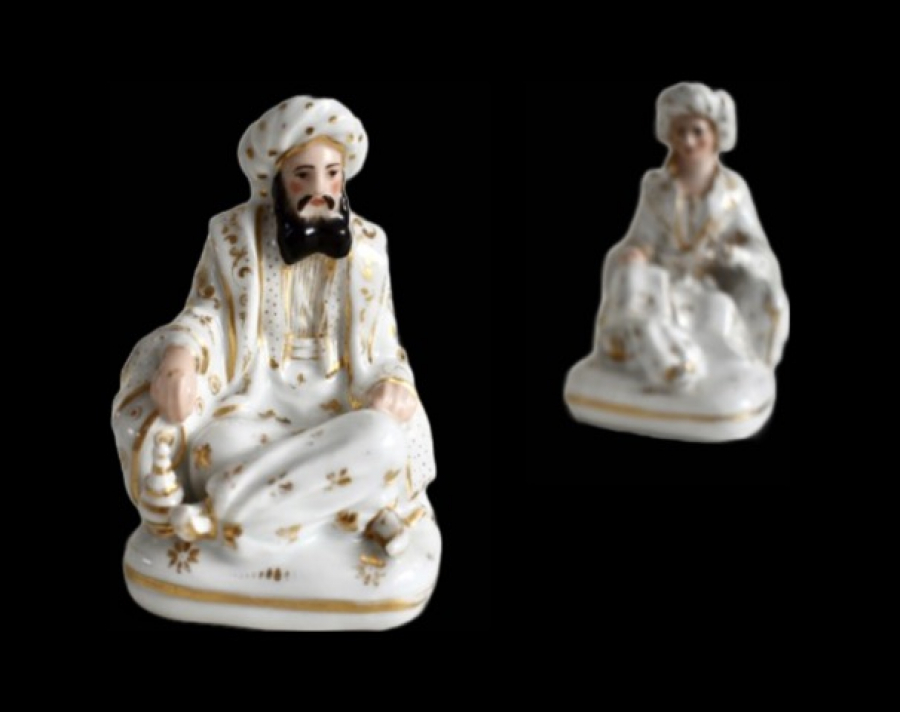Two porcelain Sultan and Sultana container models 