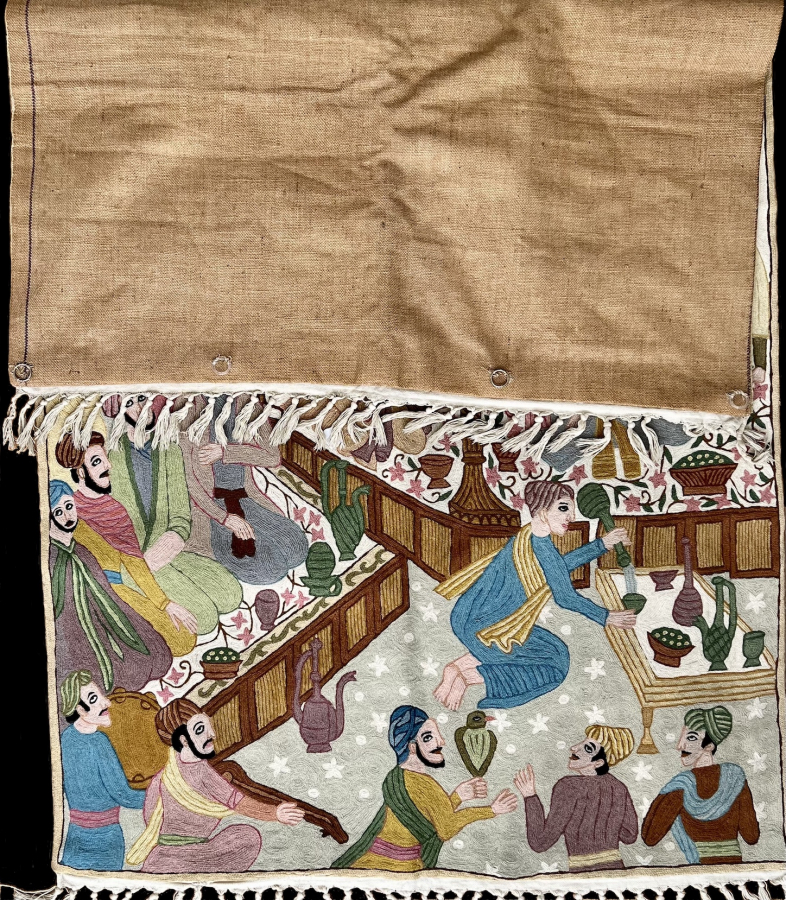 Colourful embroidery of a merry meeting