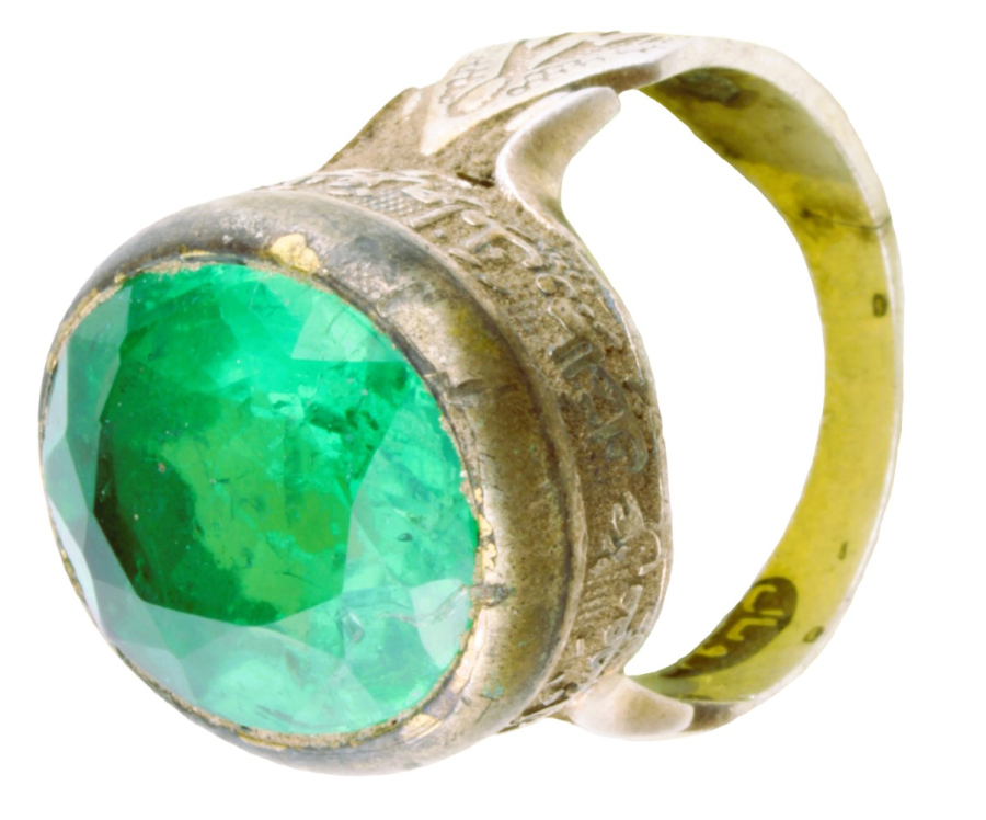 Silver ring with green stone engraved with islamic script 