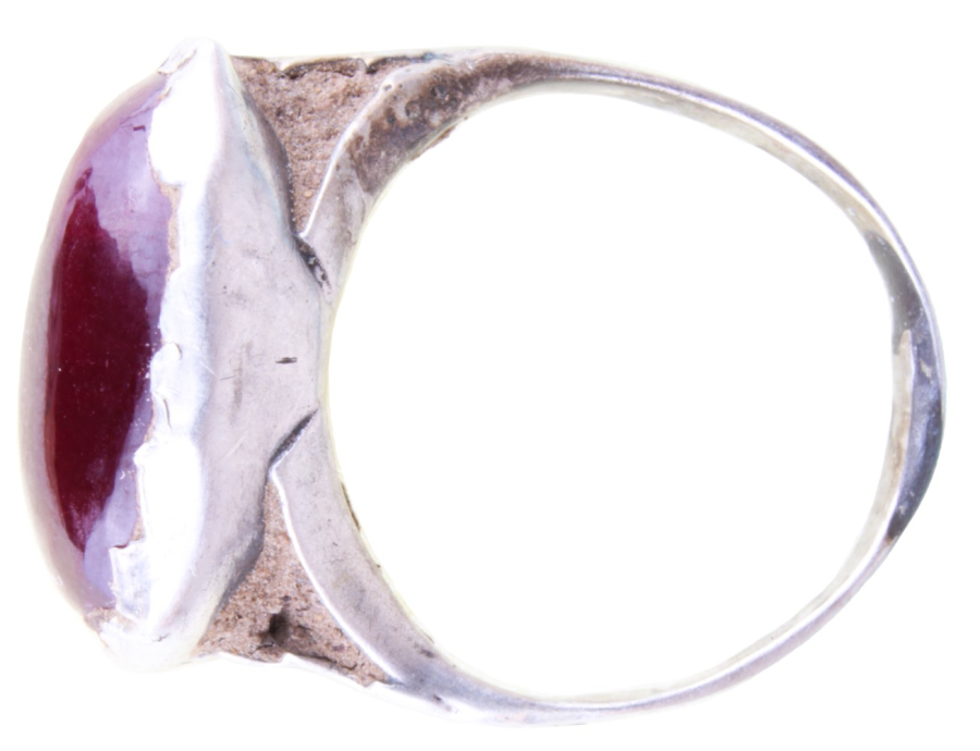 Silver ring with a ruby