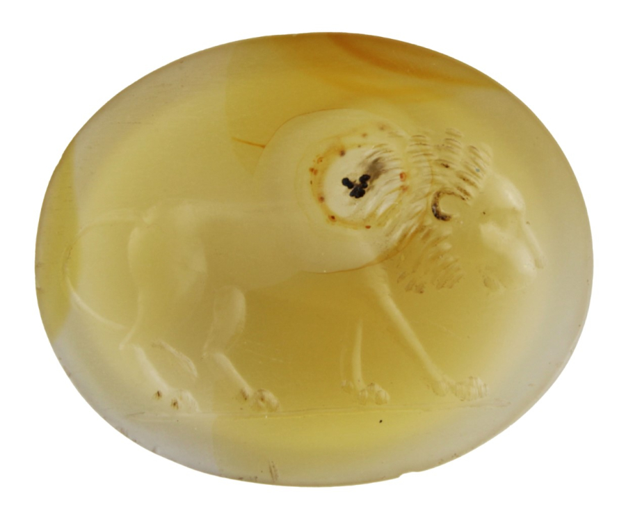 Yellow stone with an engraving of a lion