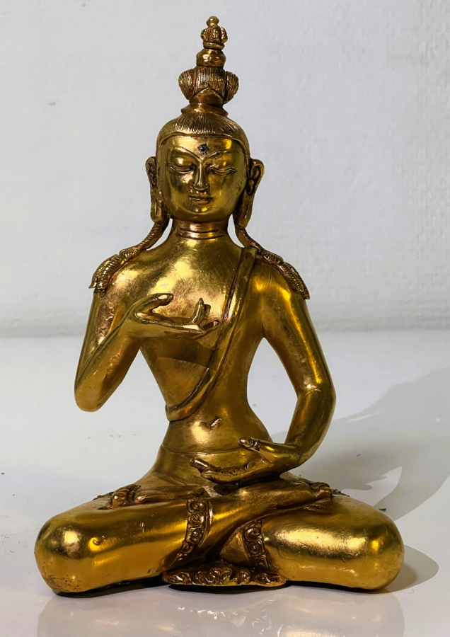 Gold colored Indian statue of Buddah