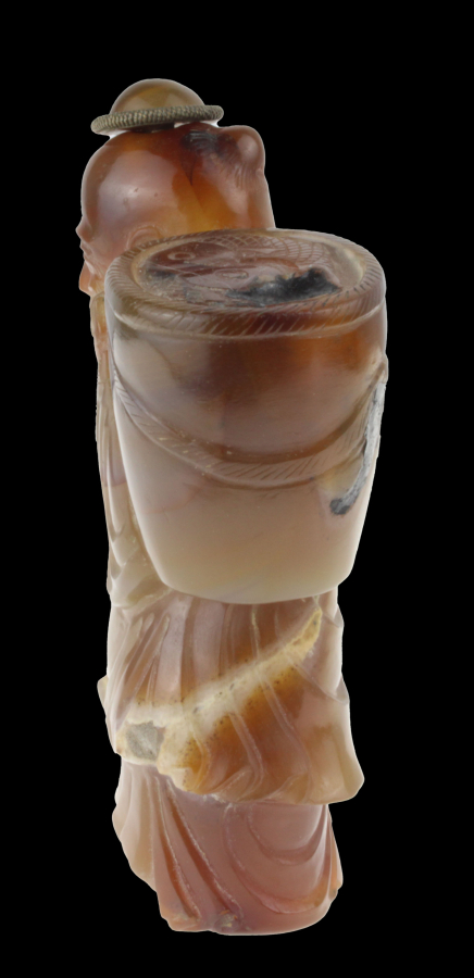 Red-brown jade snuff bottle in the form of a Chinese man